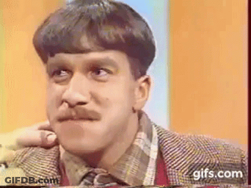Mustached Man Funny Face In Suit And Plaid Shirt GIF
