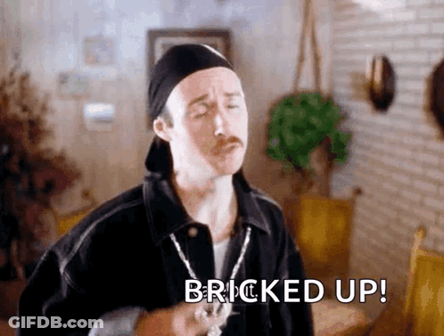 Mustached Man Hat Necklace Saying Bricked Up GIF