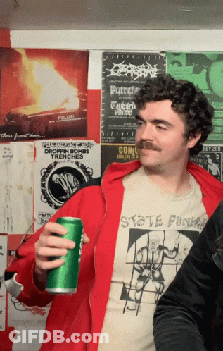 Mustached Man Holding Green Can Skate Funk Shirt GIF