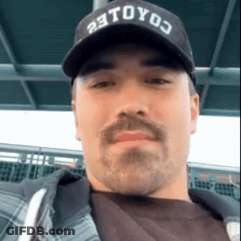Mustached Man In Coyote Hat GIF