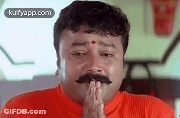 Mustached Man In Red Shirt Praying With Folded Hands GIF