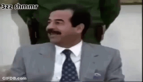 Mustached Man In Suit Making Funny Face GIF