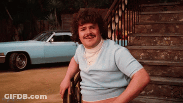 Mustached Man Leaning On Railing By Car GIF