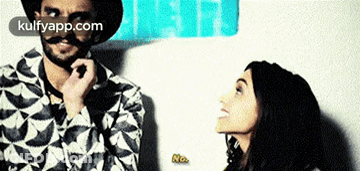Mustached Man Next To Smiling Woman Saying No GIF