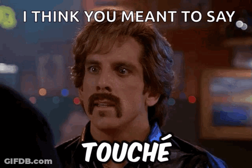 Mustached Man Saying I Think You Meant To Say Touche GIF