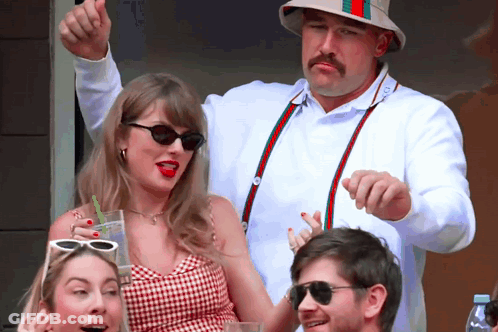 Mustached Man Thumbs Up Woman In Sunglasses GIF