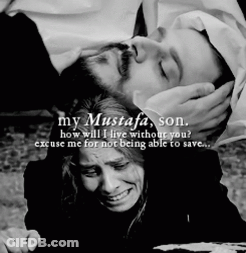 Mustafa Abi Nasi Behind Table GIF
