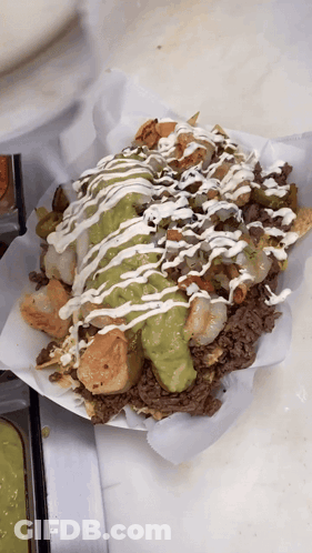 Nachos With Guacamole And Sour Cream GIF