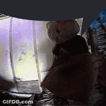 Naked Bodybuilder In Front Of Brick Wall GIF