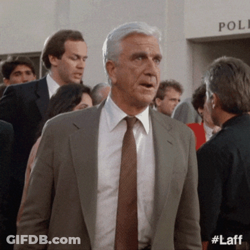Naked Gun Frank Drebin Looking Sideways GIF