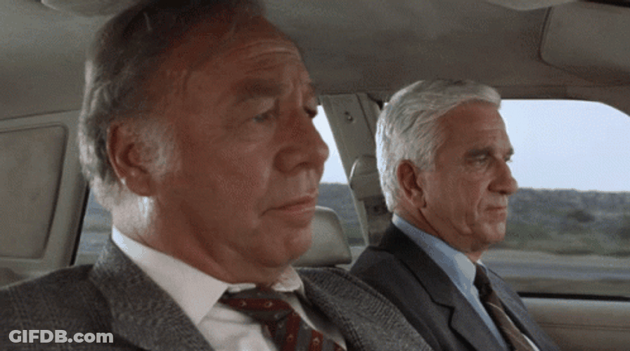 Naked Gun Frank Drebin With Captain Ed Hocken GIF