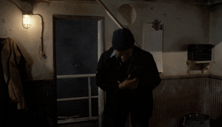 Naked Gun Officer Nordberg Bumping His Head GIF