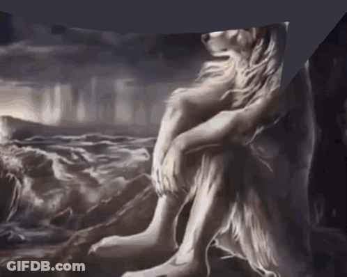 Naked Woman Sitting On A Rock GIF