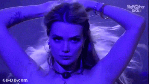 Naked Woman With Arms Outstretched On Stage GIF