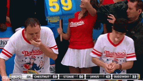 Nathan's Hot Dog Eaters Eating In Crowd GIF