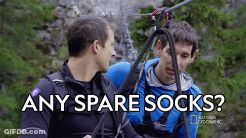 National Geographic Ad Two Men Talking Any Spare Socks GIF