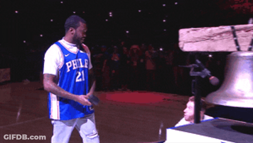 NBA Play Off Fan Striking Bell GIF