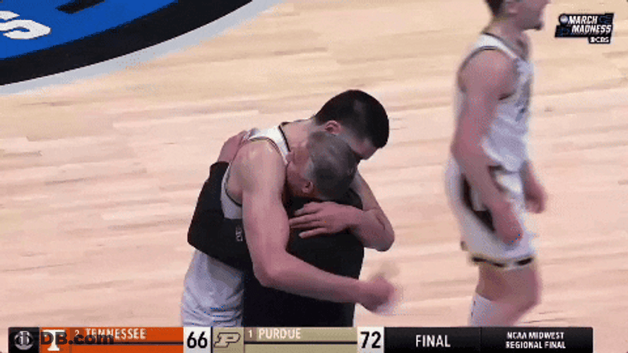 NBA Player Zach Edey Hugging Coach GIF