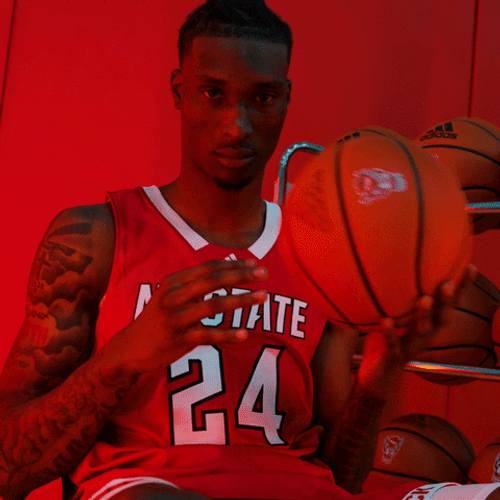 Nc State Basketball Guy Holding Jersey And Ball GIF
