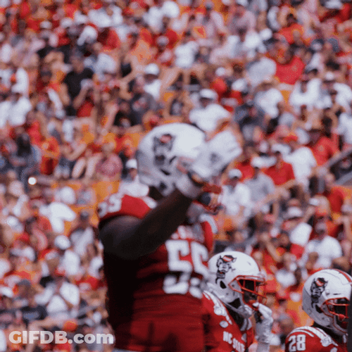 Nc State Football Player Waving Hand GIF