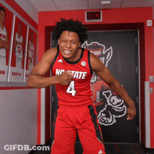 Nc State Player Flexing For Pose GIF
