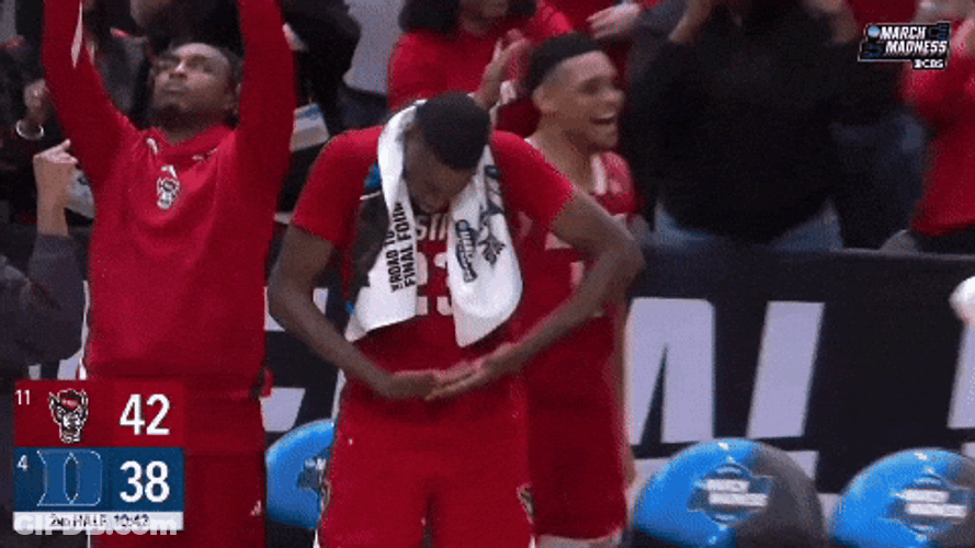 Nc State Player Gesturing Like Holding Baby GIF