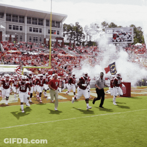 Nc State University Athletes Run For Opening Program GIF