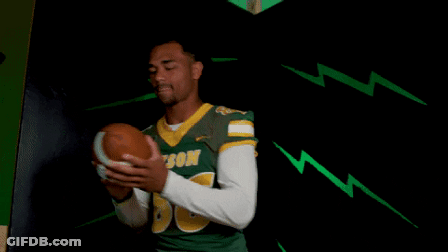 Ndsu Football Player Holding Oval Shaped Ball GIF