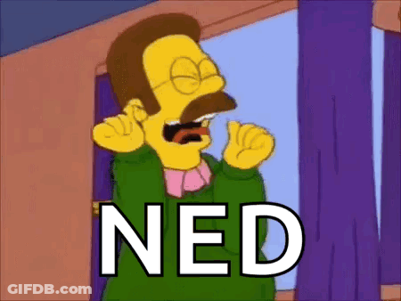 Ned From The Simpsons Is Making A Funny Face While Talking On A Cell Phone . GIF