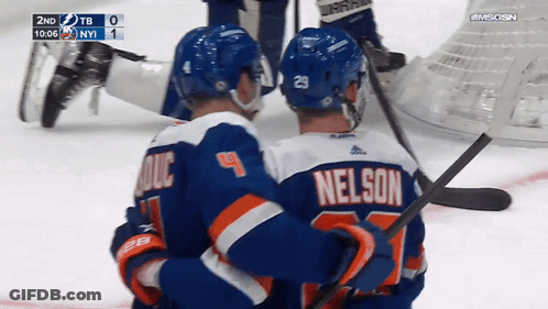 Nelson Hugging Another Hockey Player GIF