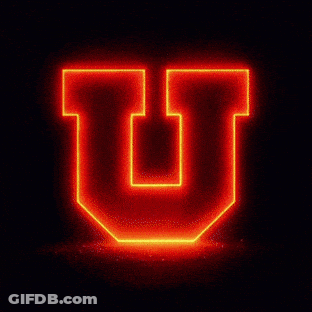 Neon Letter U With Fireworks GIF