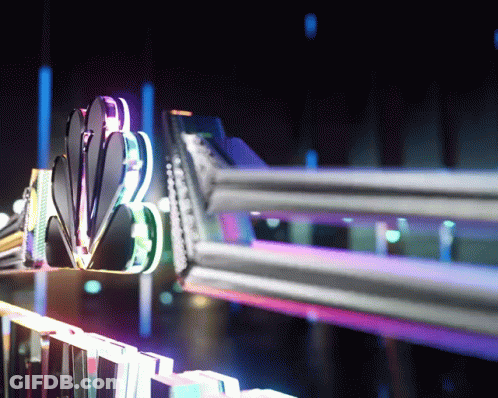 Neon NBC Sign Lit In Dark Room GIF