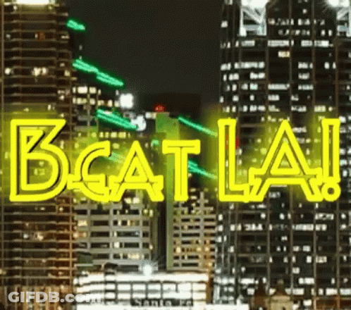 Neon Sign Saying Beat LA City Skyline GIF