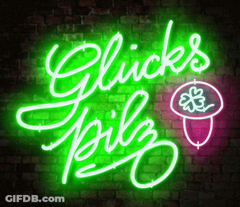 Neon Sign Saying Glücks Pilz With Mushroom GIF