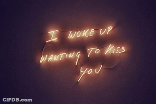 Neon Sign Saying I Woke Up Wanting To Kiss You GIF