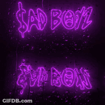 Neon Sign Saying Sad Boy On Purple Background GIF