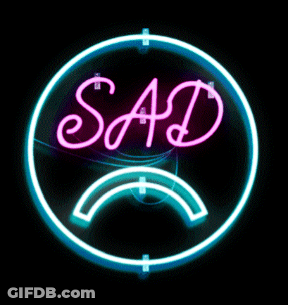 Neon Sign Saying Sad With Sad Face GIF
