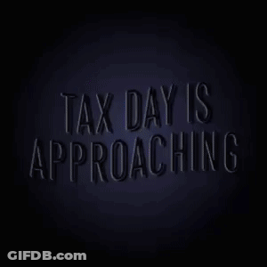 Neon Sign Saying Tax Day Approaching GIF