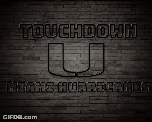 Neon Sign Saying Touchdown Miami Hurricanes On Brick Wall GIF