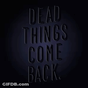 Neon Sign That Says Dead Things Come Back On A Dark Background GIF