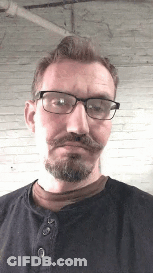 Nerd Bearded Guy Eye Brow Raise GIF
