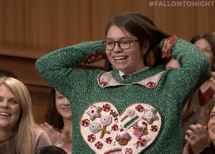Nerdy Girl Presents Ugly Sweater GIF