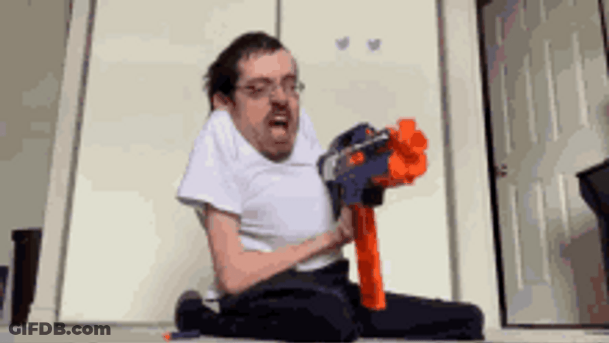 Nerdy Guy Epic Toy Gun GIF