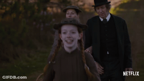 Netflix Ad Girl With Red Hair And Braids GIF