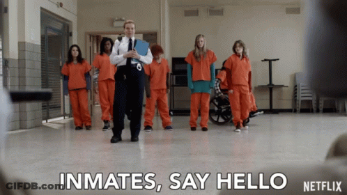 Netflix Ad Inmates Walking In Hallway GIF