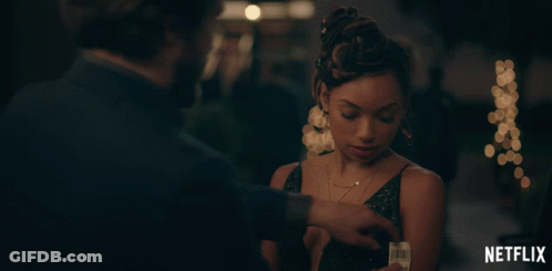 Netflix Ad Man Pointing At Woman In Dress GIF