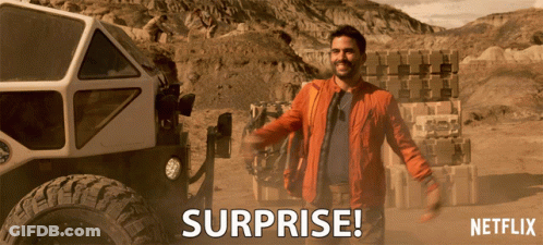 Netflix Ad Man Standing In Front Of Vehicle Saying Surprise GIF