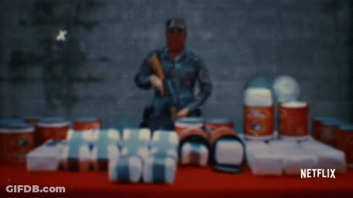 Netflix Ad Man With Gun And Cans GIF