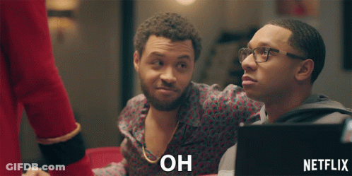 Netflix Ad Two Men Looking At Laptop GIF