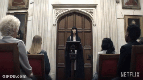 Netflix Ad Woman Giving Speech To Group Of Women GIF
